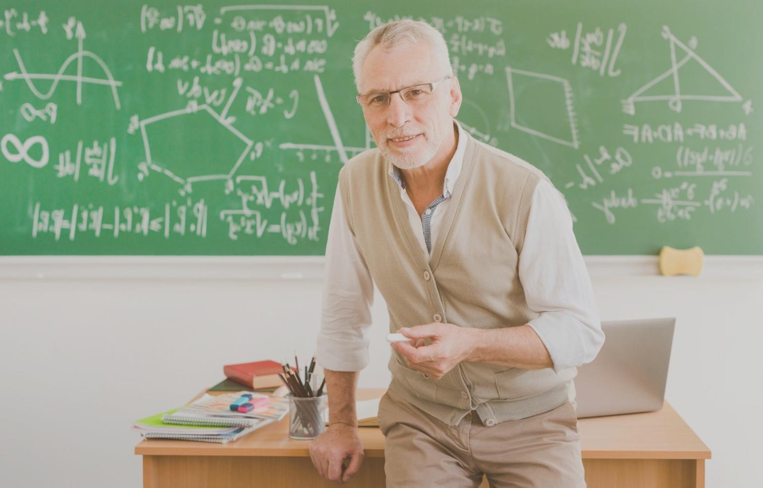 Financial analyst reviewing valuation models on multiple screens
