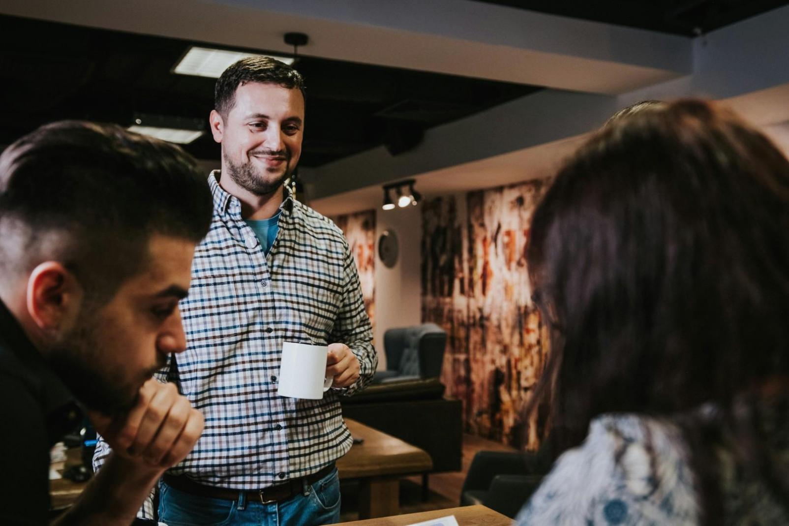 Financial analyst reviewing valuation reports and market data